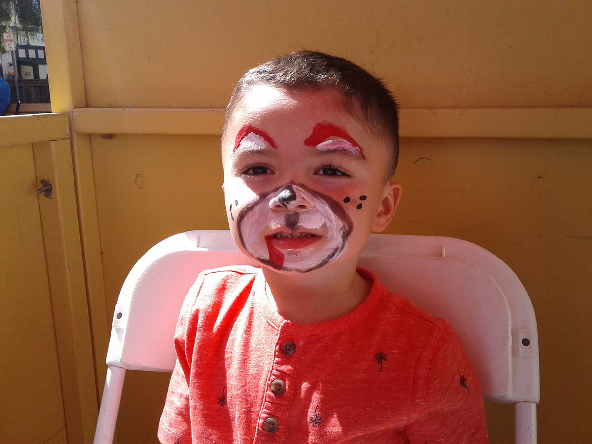 young-man---dog-facepainting Young man with dog face